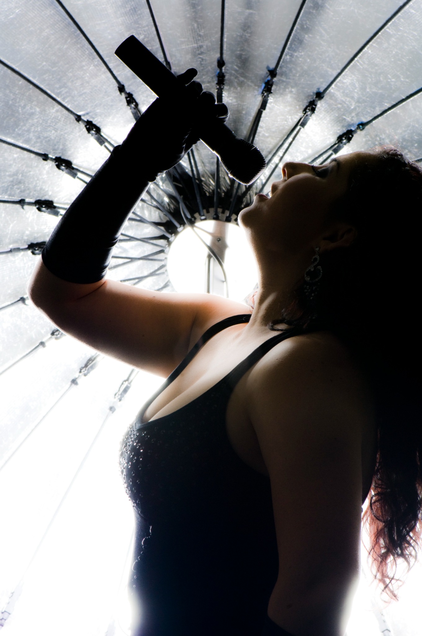 Nicole singing in an earlier professional portrait